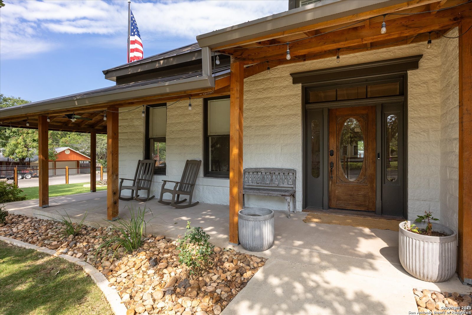 504 6th Street Comfort, TX 78013 - Photo 6 of 48 a front view of a house with patio