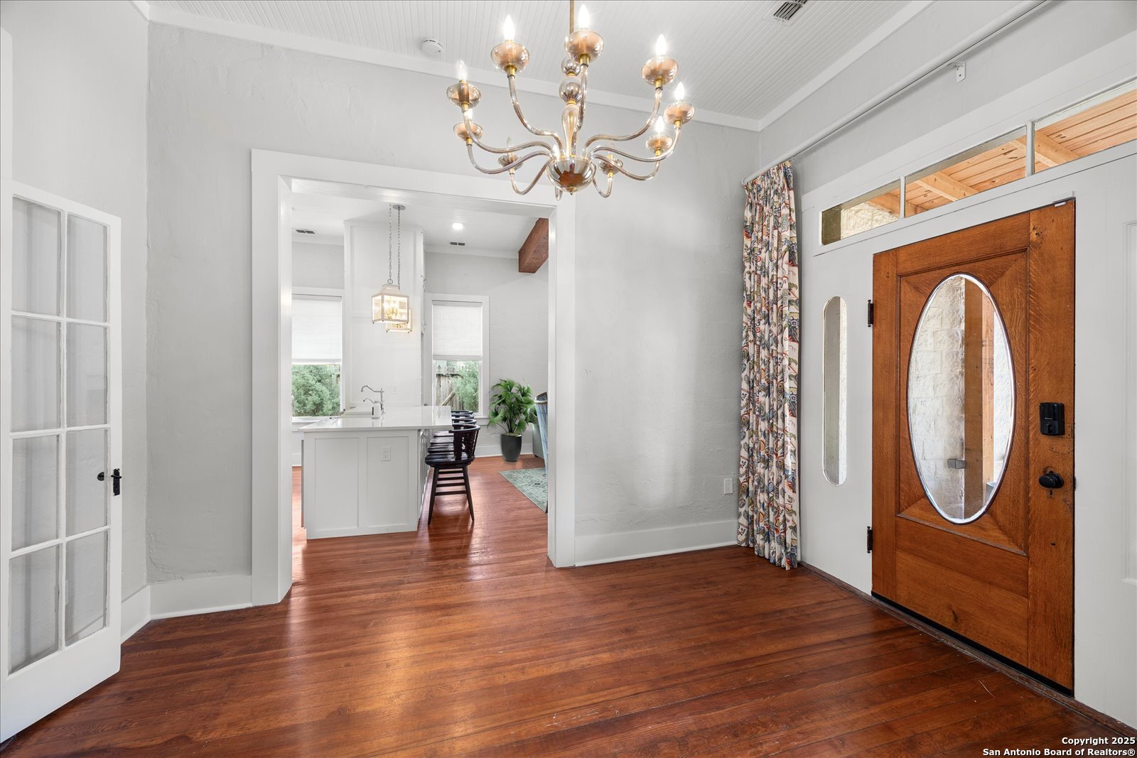 504 6th Street Comfort, TX 78013 - Photo 7 of 48 a view of an entryway with wooden floor