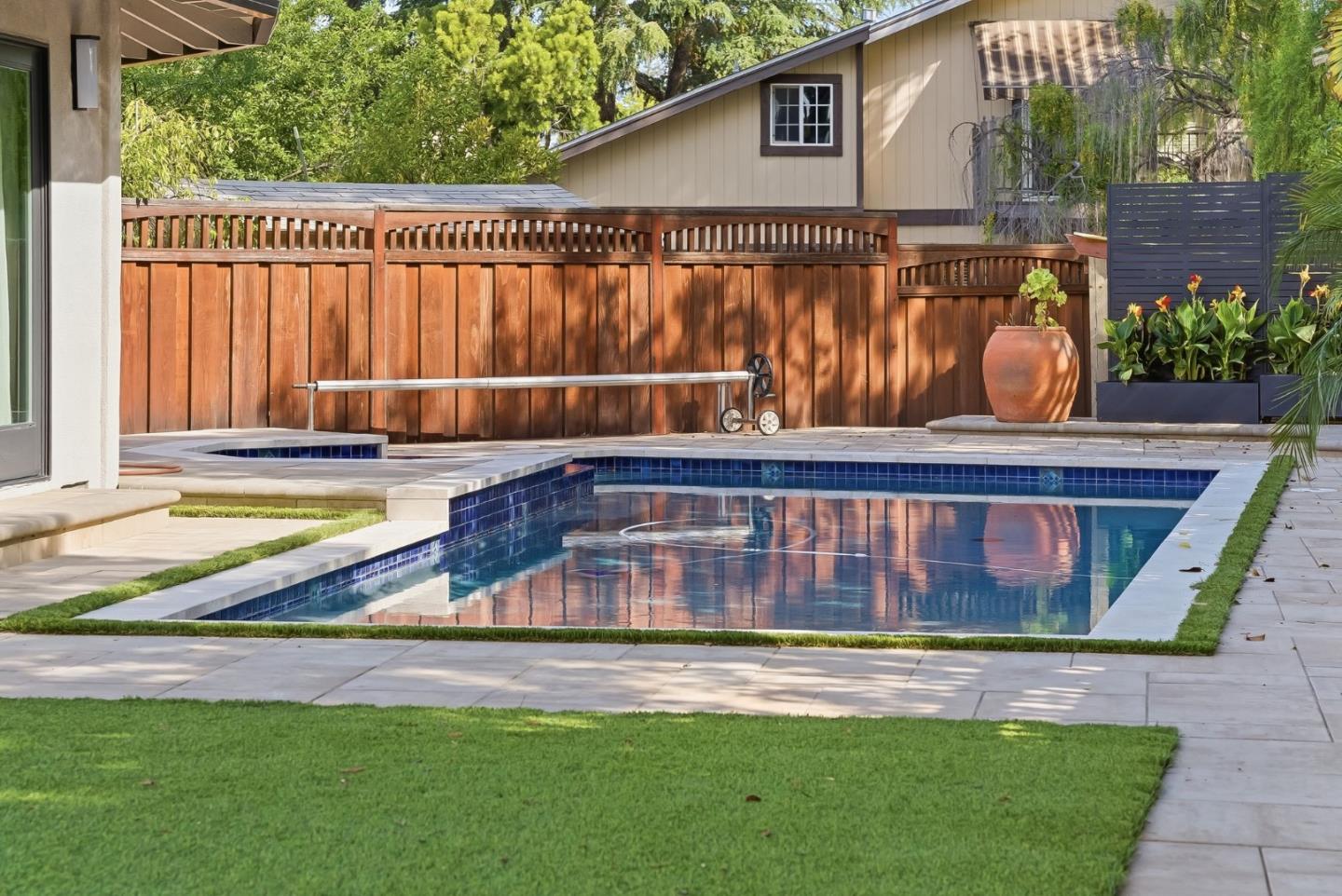 845 Pollard Road Los Gatos, CA 95032 - Photo 44 of 47 a view of swimming pool with a yard and plants