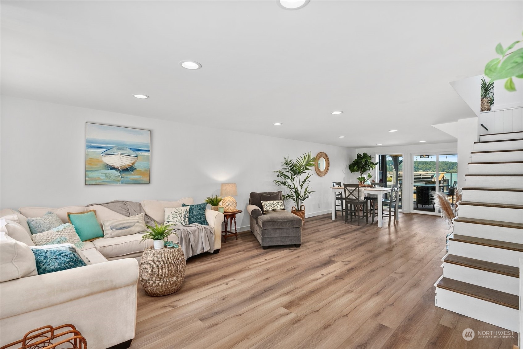 4234 Sunset Beach Road University Place, WA 98466 - Photo 21 of 40 a living room with furniture and wooden floor