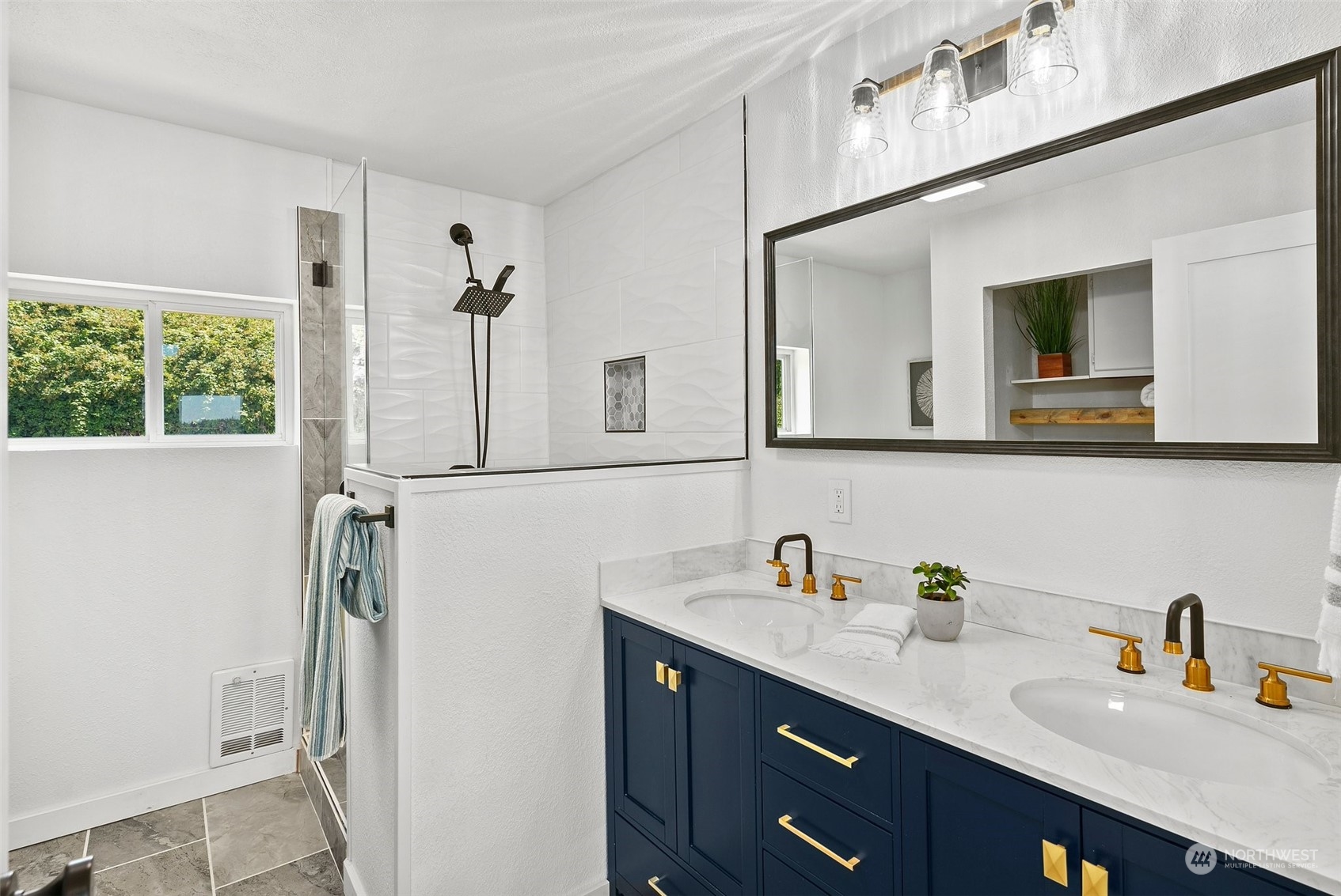 4234 Sunset Beach Road University Place, WA 98466 - Photo 27 of 40 a bathroom with a sink and a mirror
