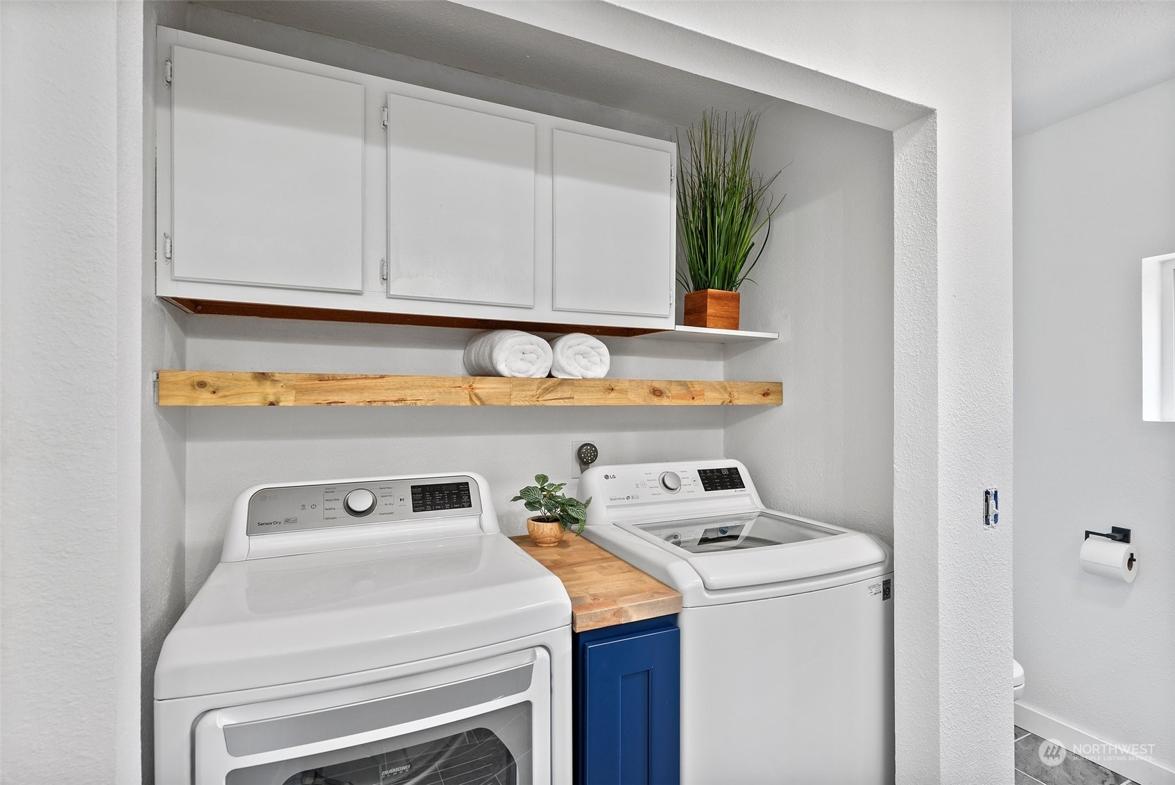 4234 Sunset Beach Road University Place, WA 98466 - Photo 28 of 40 a utility room with dryer and washer