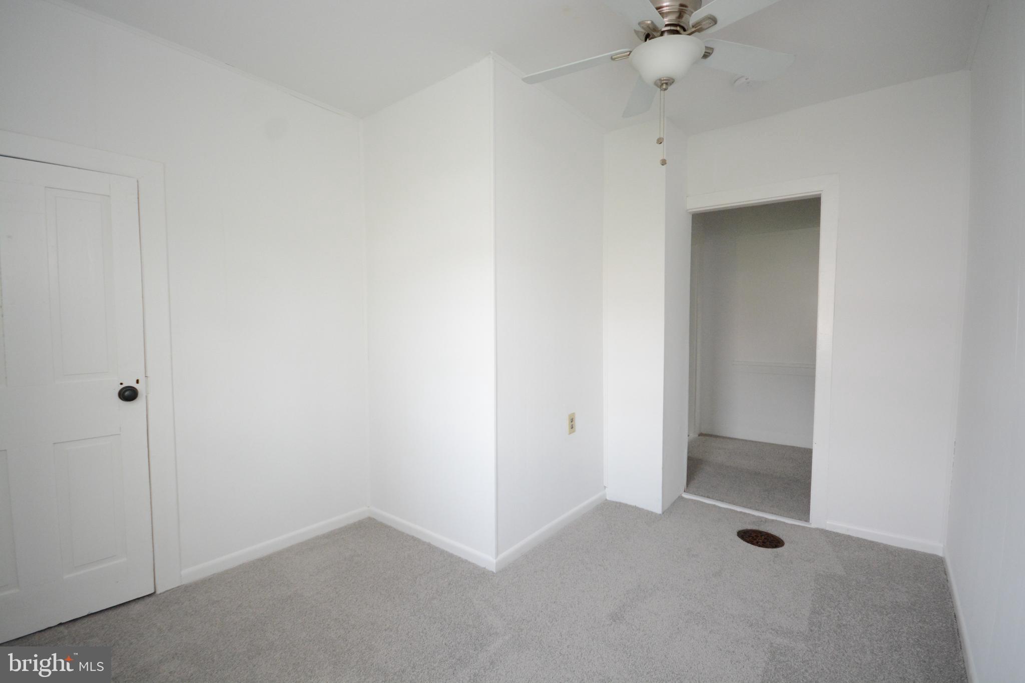 12108 Auburn Road Thurmont, MD 21788 - Photo 19 of 33 a view of an empty room with a fan