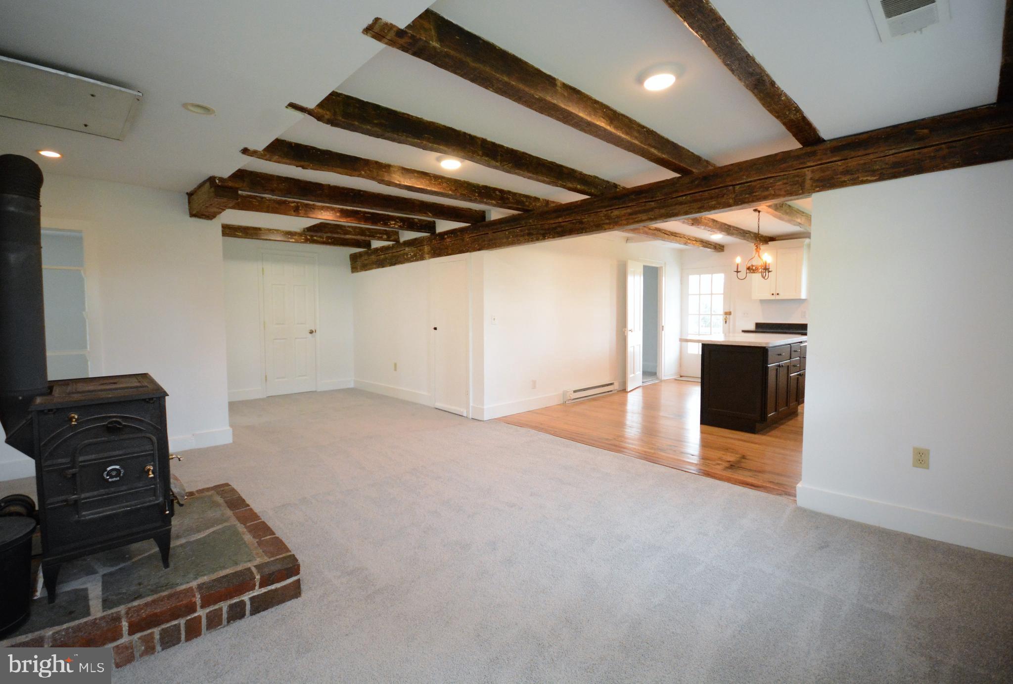12108 Auburn Road Thurmont, MD 21788 - Photo 6 of 33 a view of a livingroom with wooden floor
