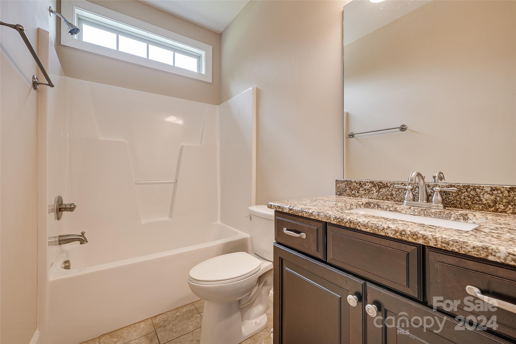 13021 Pumpkin Way Drive Mint Hill, NC 28227 - Photo 18 of 41 a bathroom with a granite countertop sink toilet and shower