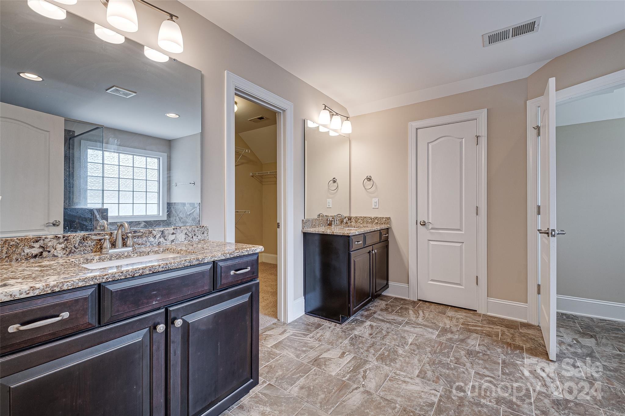 13021 Pumpkin Way Drive Mint Hill, NC 28227 - Photo 33 of 41 a bathroom with a sink and a mirror