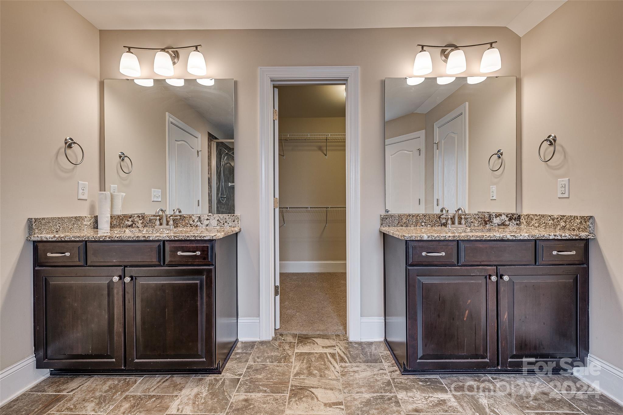 13021 Pumpkin Way Drive Mint Hill, NC 28227 - Photo 35 of 41 a bathroom with a granite countertop sink a mirror and a shower
