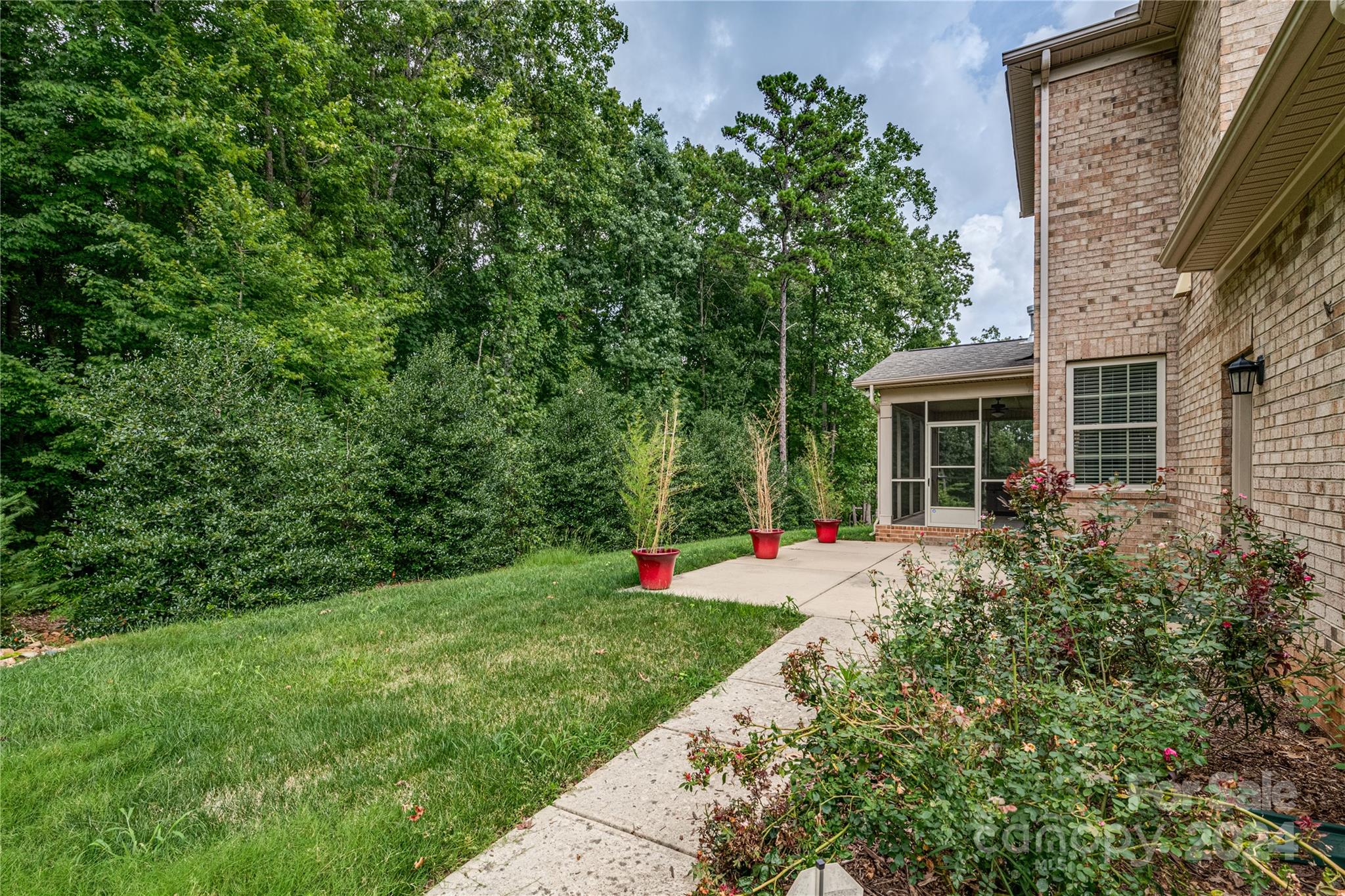 13021 Pumpkin Way Drive Mint Hill, NC 28227 - Photo 40 of 41 a view of a house with a yard and sitting area