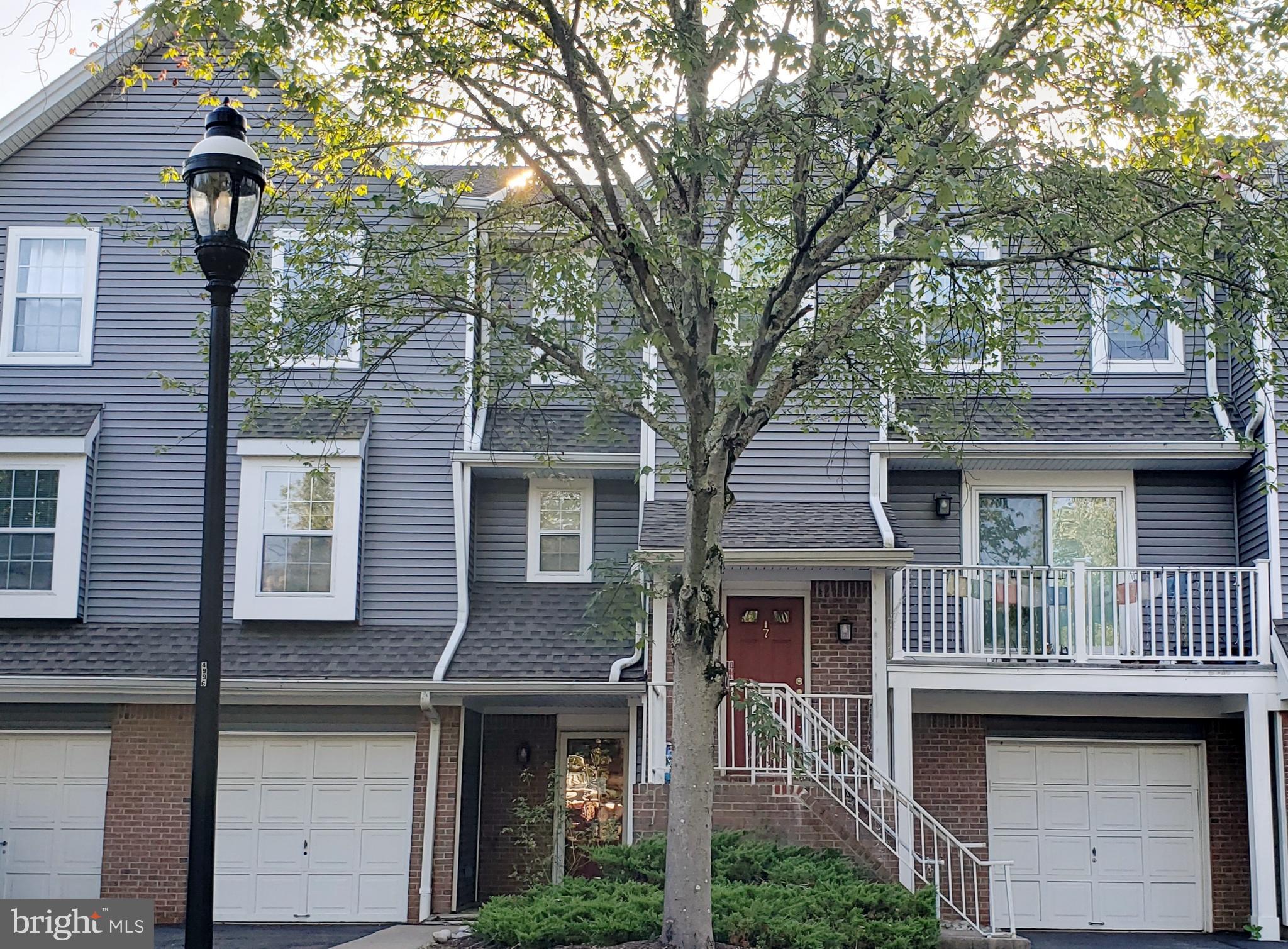 Front Entrance With Garage And Parking