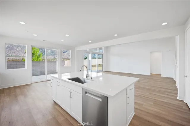 a view of a kitchen with a sink