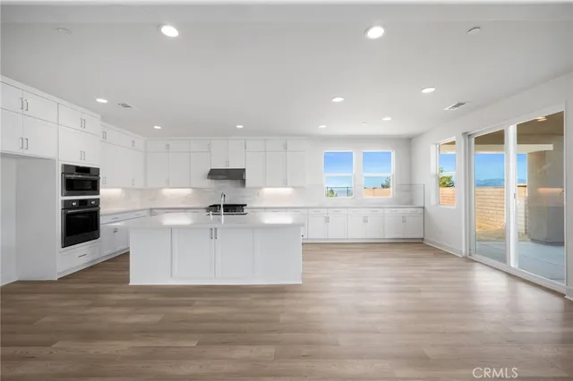 a view of a balcony with lake view and a ocean view