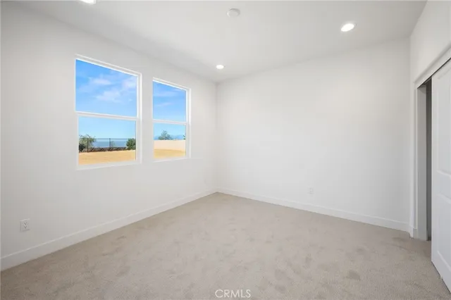 a bathroom with a sink vanity and mirror