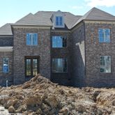 a brick building with a large windows