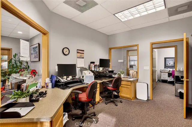 a view of a workspace with furniture and toys
