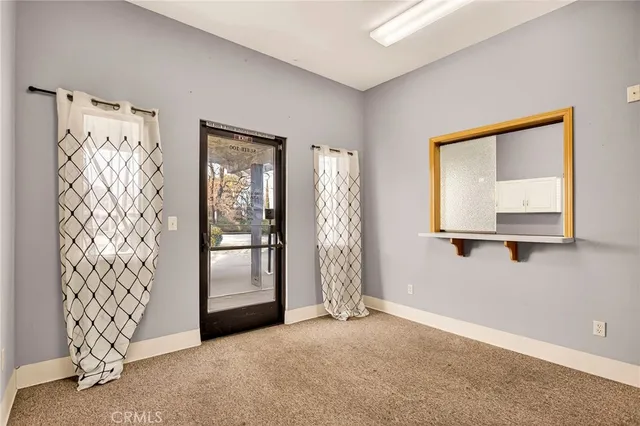 an empty room with windows