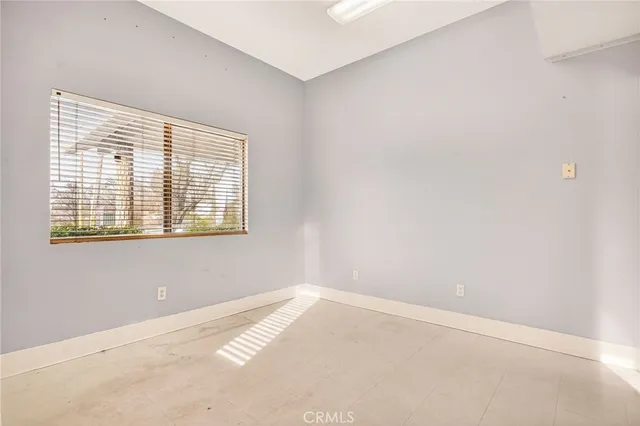 an empty room with a window