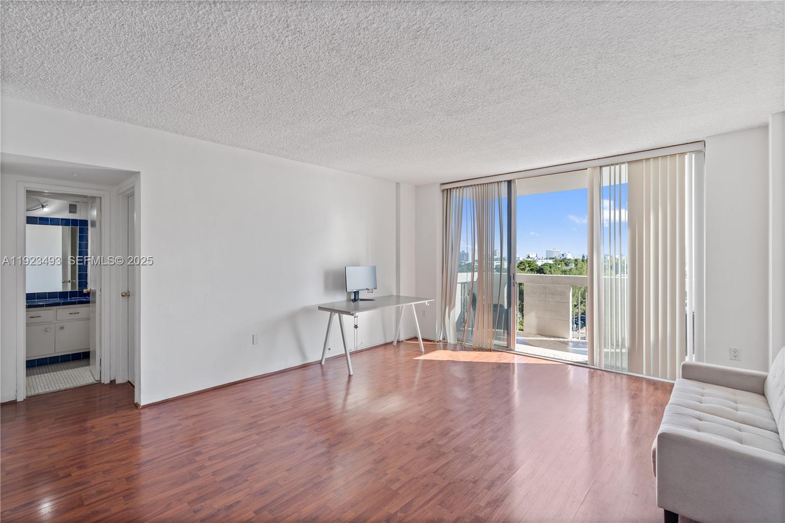800 West Avenue, Unit 722 Miami Beach, FL 33139 - Photo 11 of 33 a view of livingroom with furniture and wooden floor