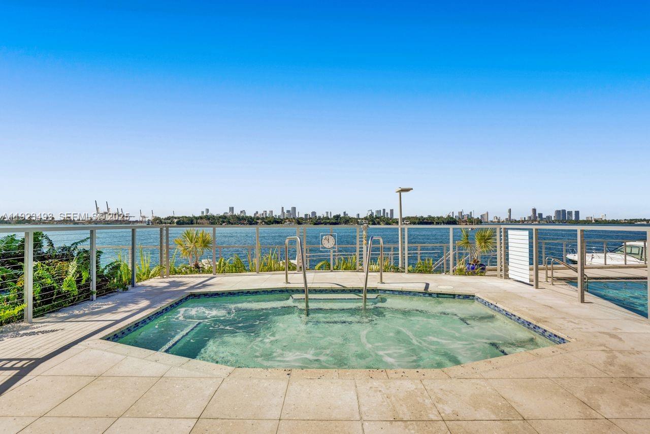 800 West Avenue, Unit 722 Miami Beach, FL 33139 - Photo 21 of 33 a view of a swimming pool with a lounge chair