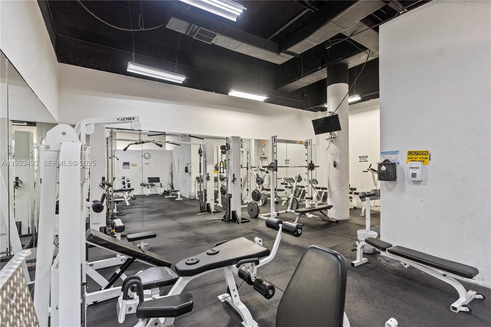 800 West Avenue, Unit 722 Miami Beach, FL 33139 - Photo 28 of 33 a view of a room with gym equipment