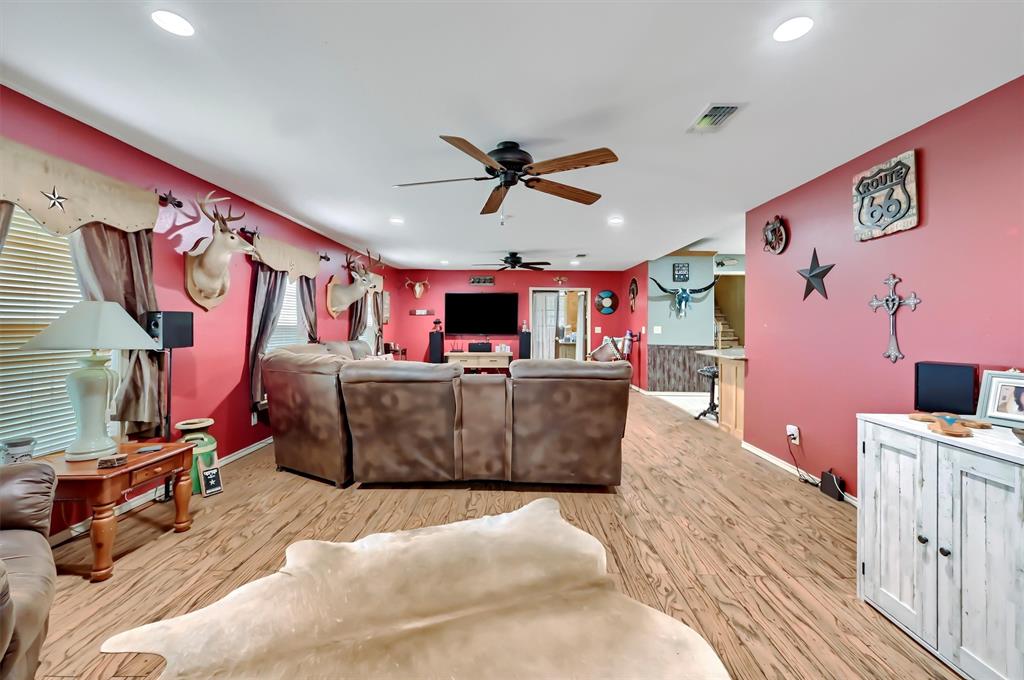 3138 Scarbrough Road Sadler, TX 76264 - Photo 12 of 40 a living room with furniture and kitchen view