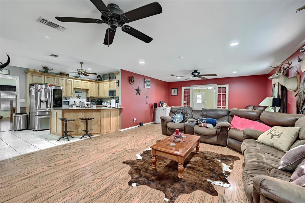 3138 Scarbrough Road Sadler, TX 76264 - Photo 14 of 40 a living room with furniture and kitchen view
