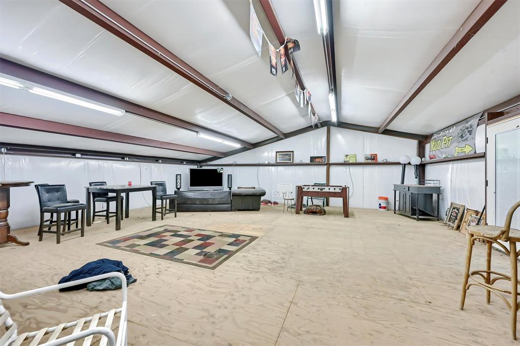 3138 Scarbrough Road Sadler, TX 76264 - Photo 35 of 40 a living room with furniture and a table