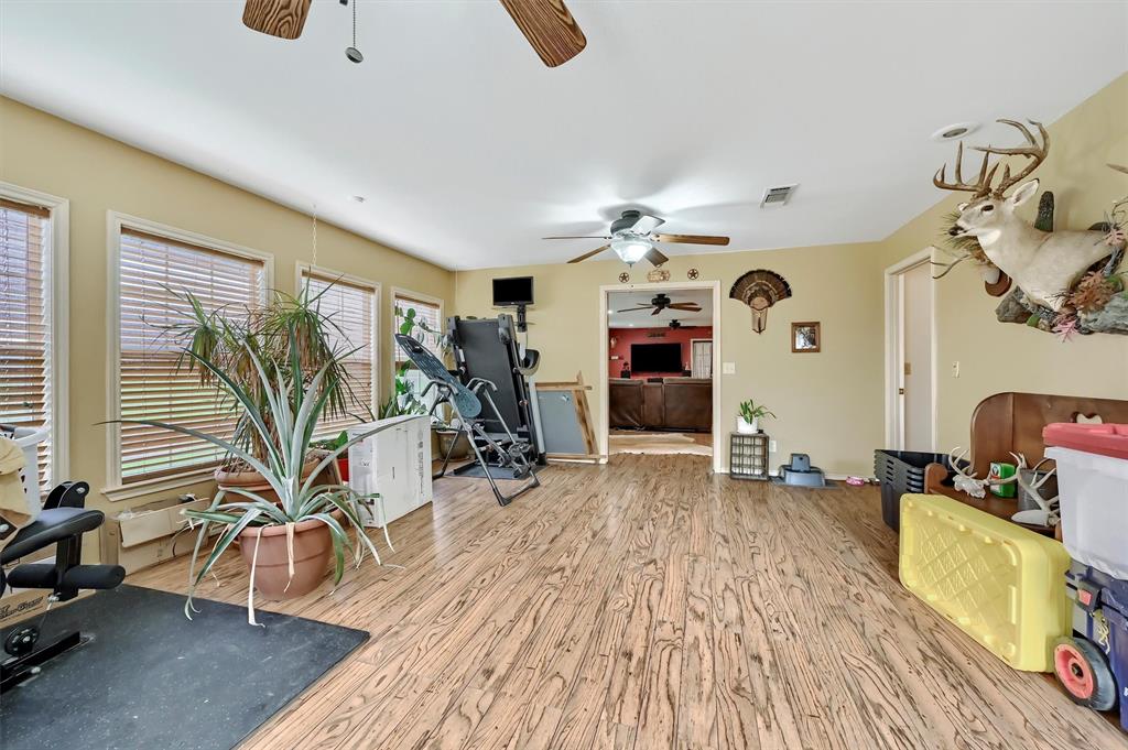 3138 Scarbrough Road Sadler, TX 76264 - Photo 10 of 40 a view of a room with gym equipment