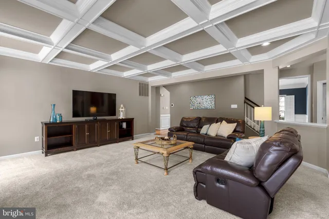 a kitchen with a refrigerator and cabinets