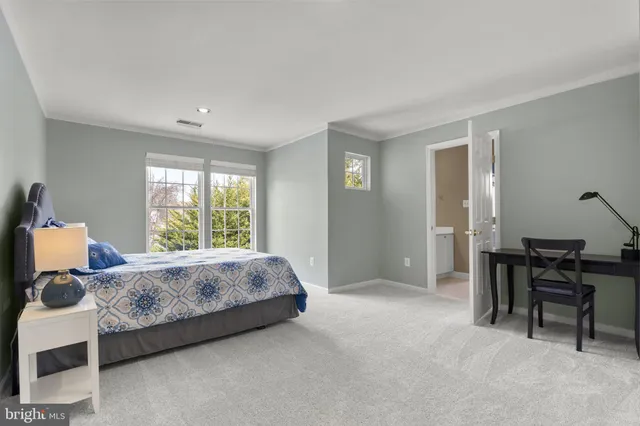 a view of a patio with couches chairs and a yard