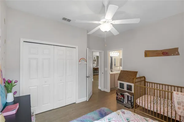 a view of a livingroom with furniture and staircase