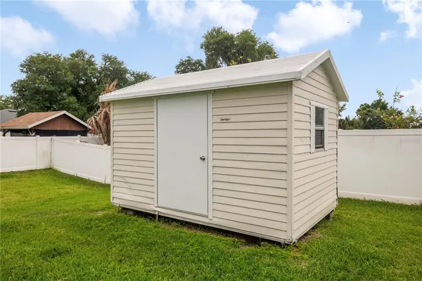 a view of a backyard with slide