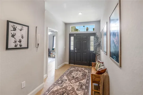 a bedroom with furniture and a bathroom