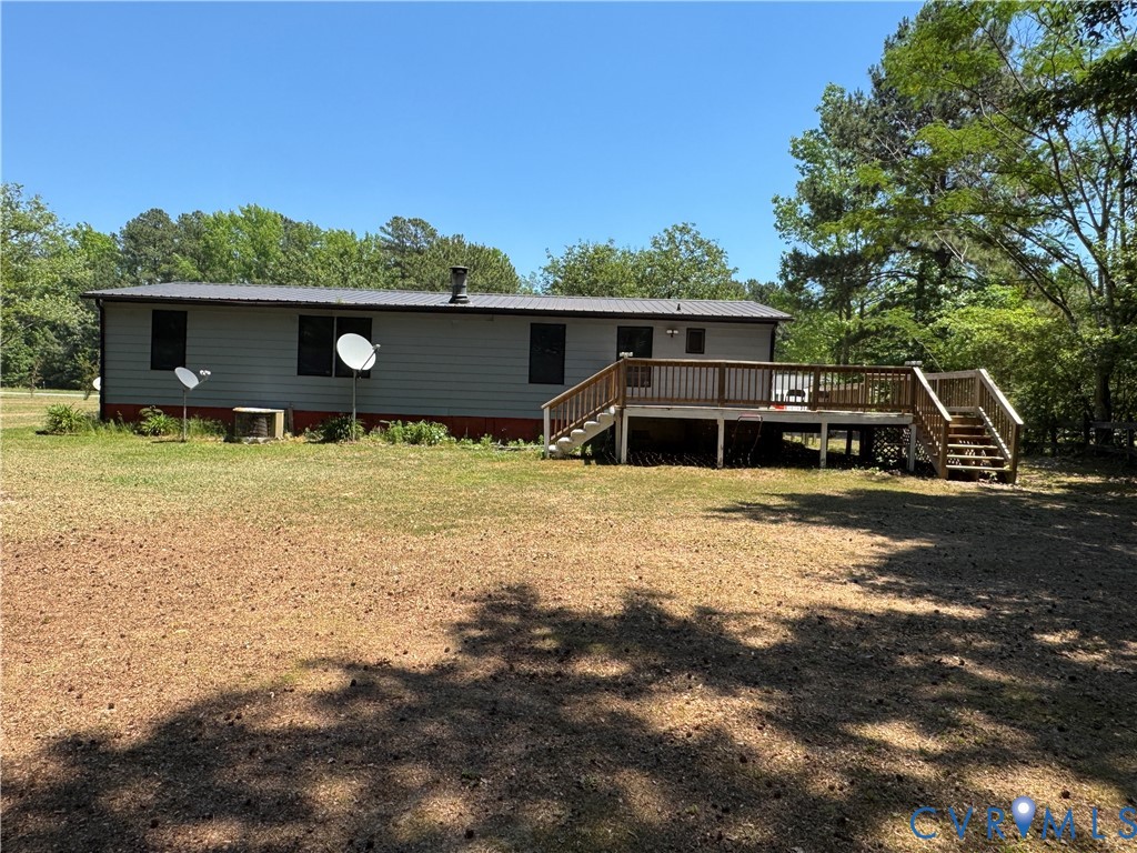 371 Horseshoe Road Jarratt, VA 23867 - Photo 7 of 21 a view of a house with a yard