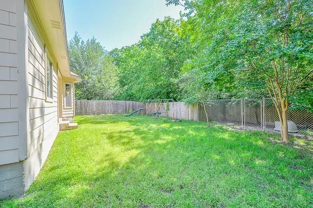 a view of outdoor space and yard