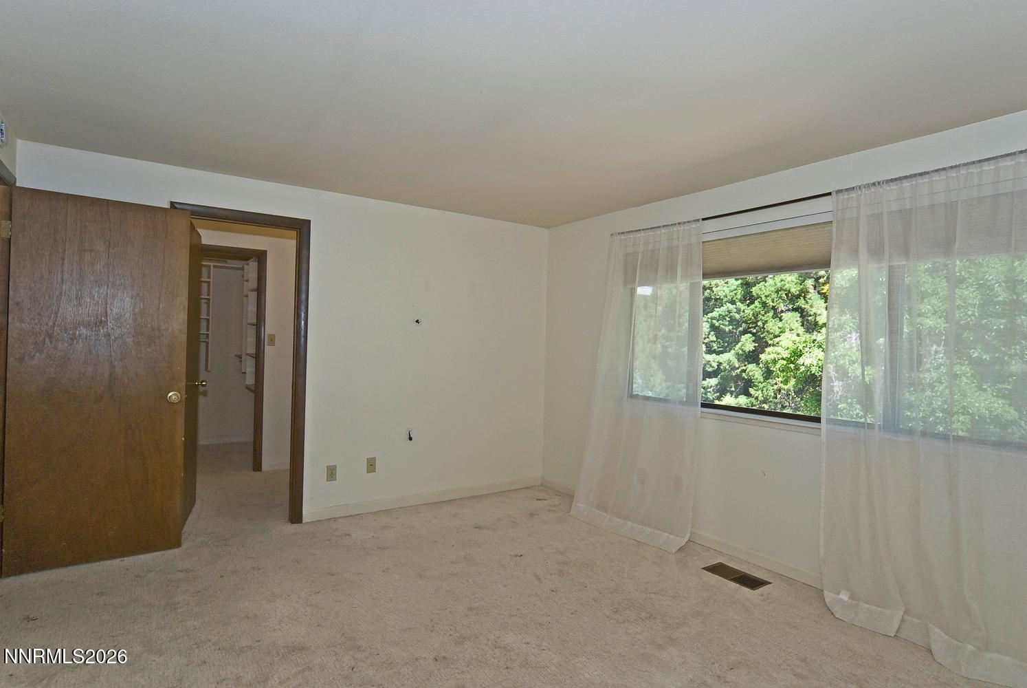 3185 Corey Drive Reno, NV 89509 - Photo 24 of 46 046-038-Primary Bedroom-1494x1000