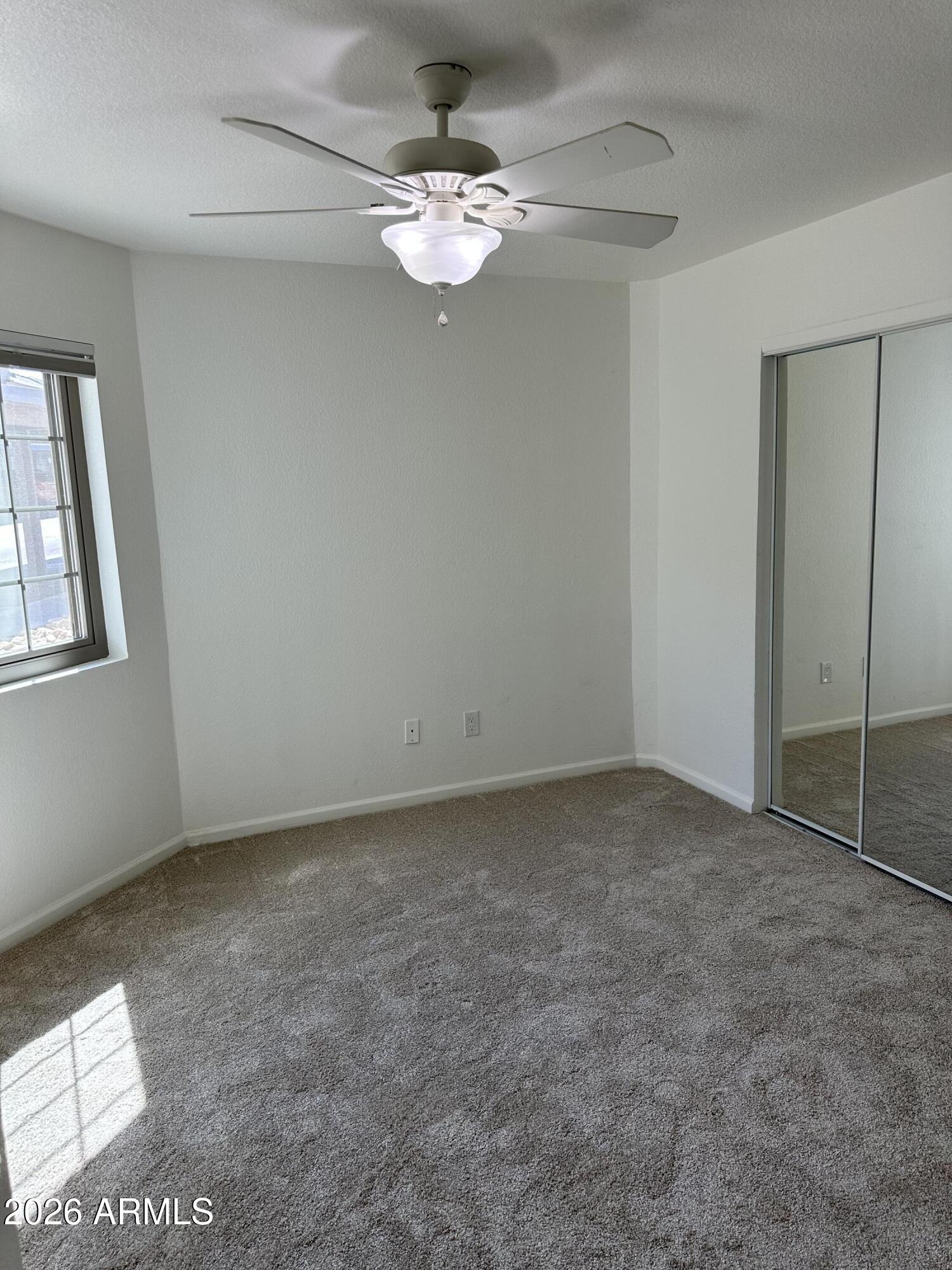 1720 East Thunderbird Road, Unit 1019 Phoenix, AZ 85022 - Photo 25 of 47 a view of an empty room with a window
