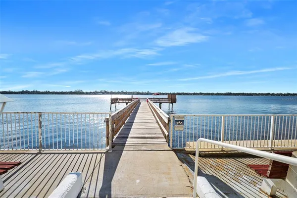 a view of roof deck with patio