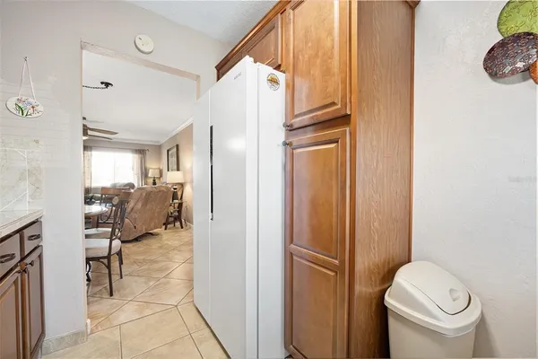 a bathroom with a toilet a sink and shower