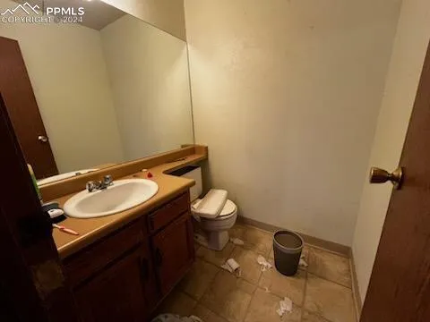 a bathroom with a sink and a toilet