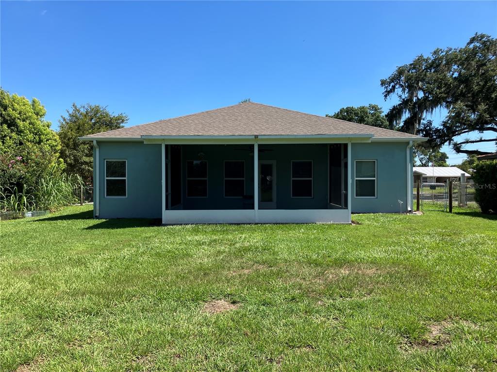 3834 Charter Road Lakeland, FL 33810 - Photo 26 of 39 front view of a house with a garden