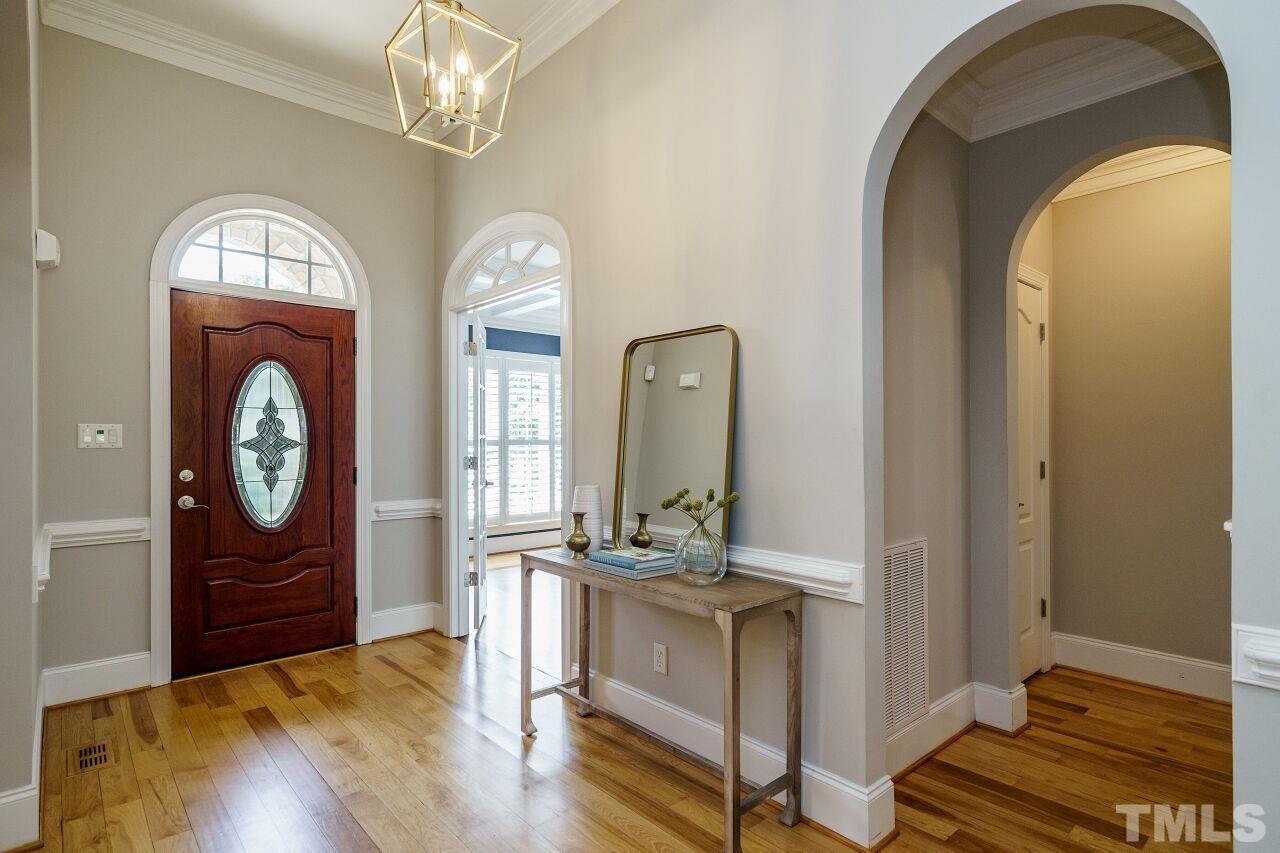 4813 Patton Ridge Court Raleigh, NC 27612 - Photo 3 of 30 a view of living room with wooden floor