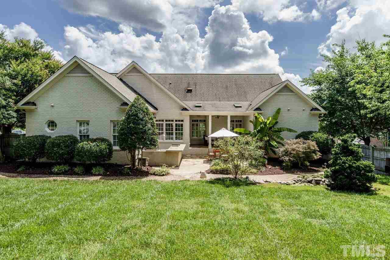 4813 Patton Ridge Court Raleigh, NC 27612 - Photo 30 of 30 a front view of a house with a yard and garden
