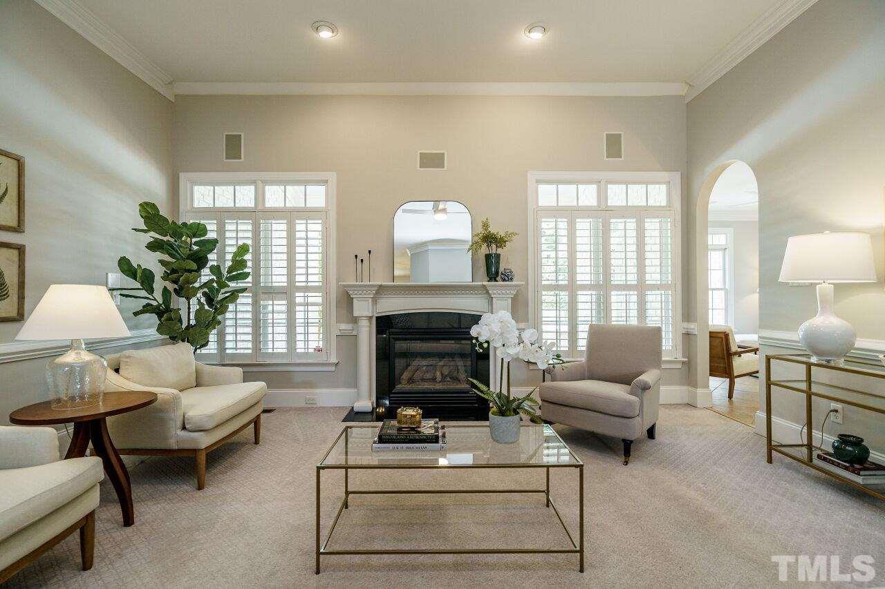 4813 Patton Ridge Court Raleigh, NC 27612 - Photo 8 of 30 a living room with furniture fireplace and window