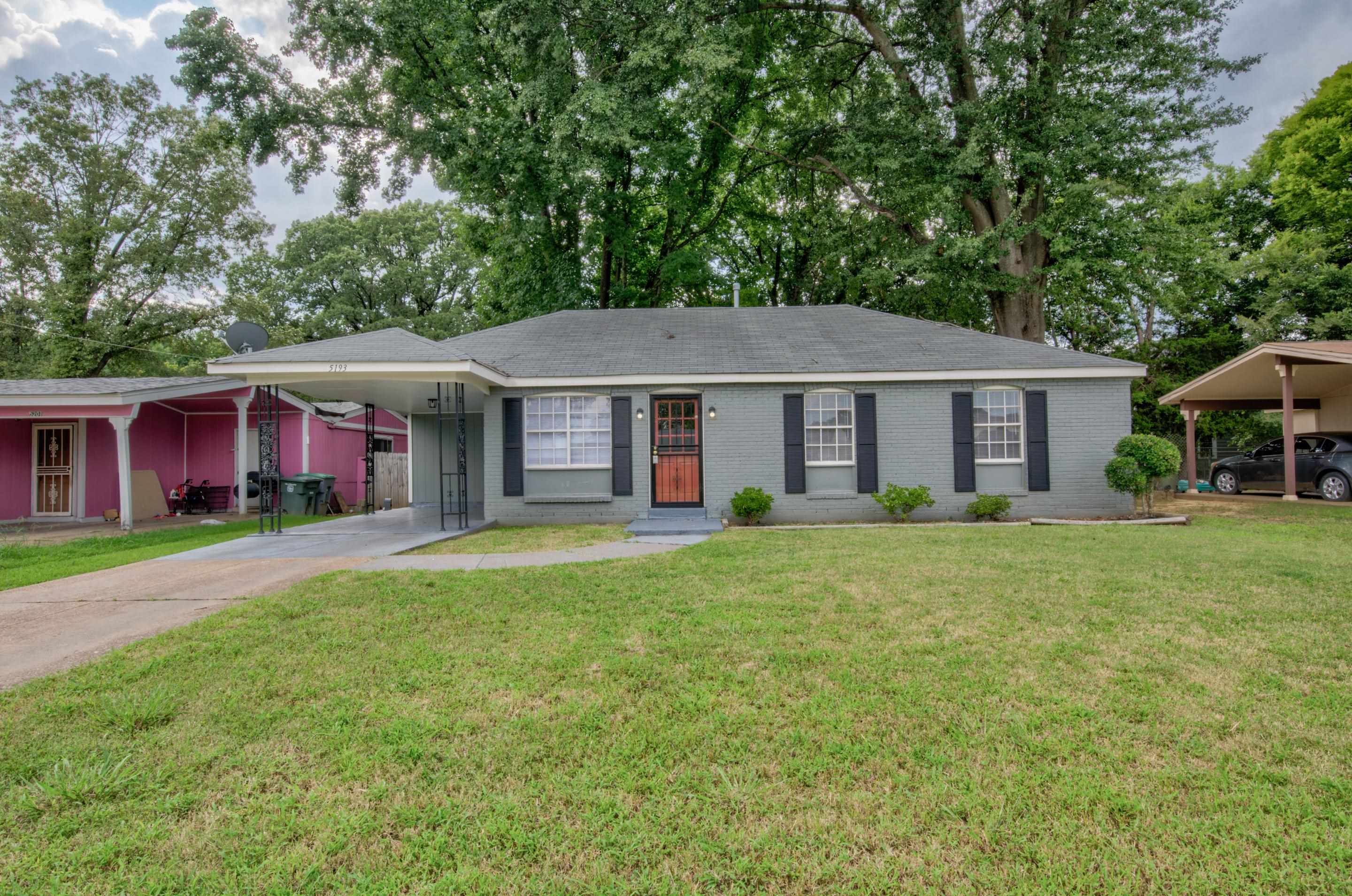 5193 Fairley Road Memphis, TN 38109 - Photo 1 of 17 a front view of a house with a garden