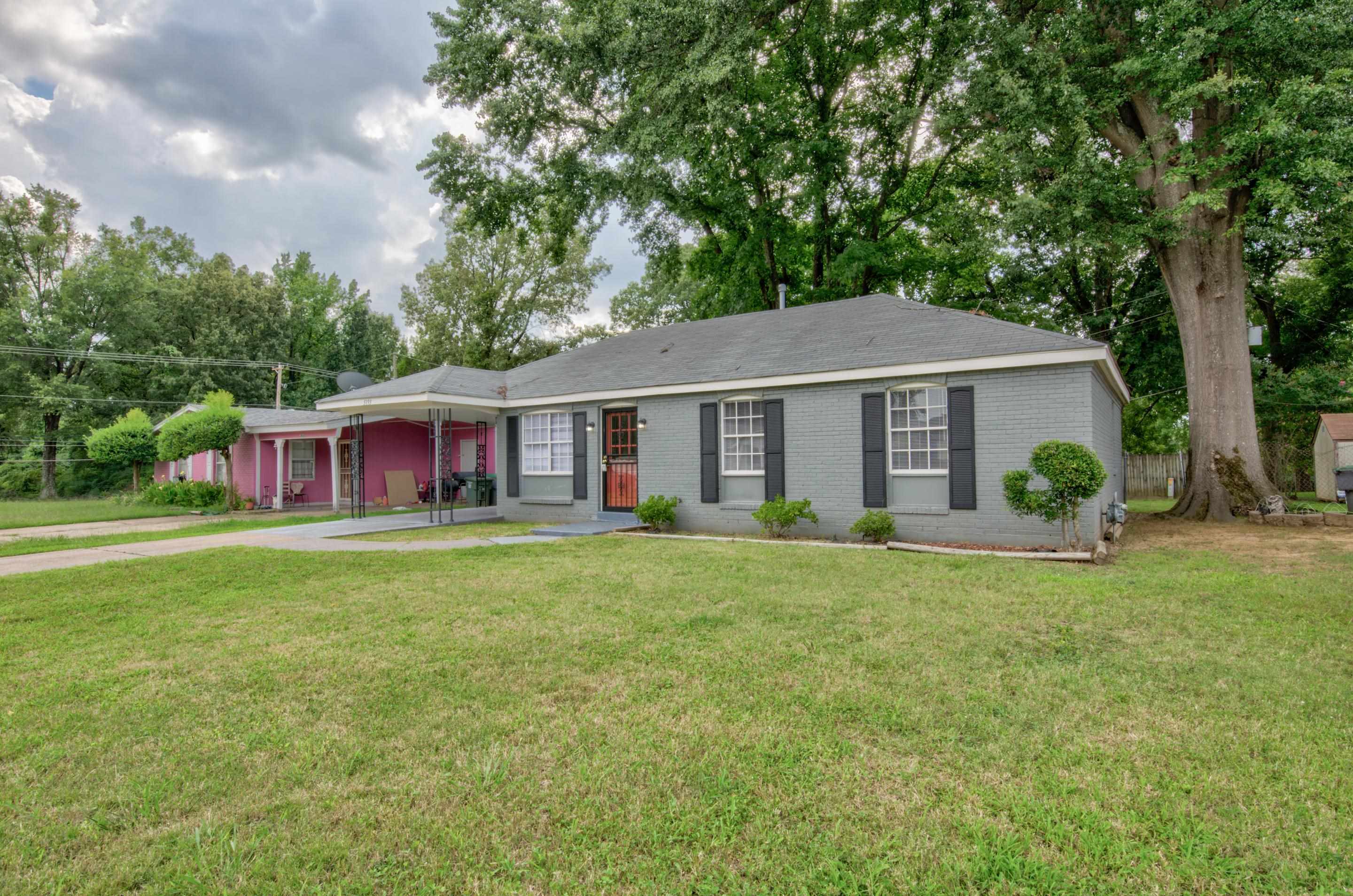 5193 Fairley Road Memphis, TN 38109 - Photo 16 of 17 a front view of a house with a garden