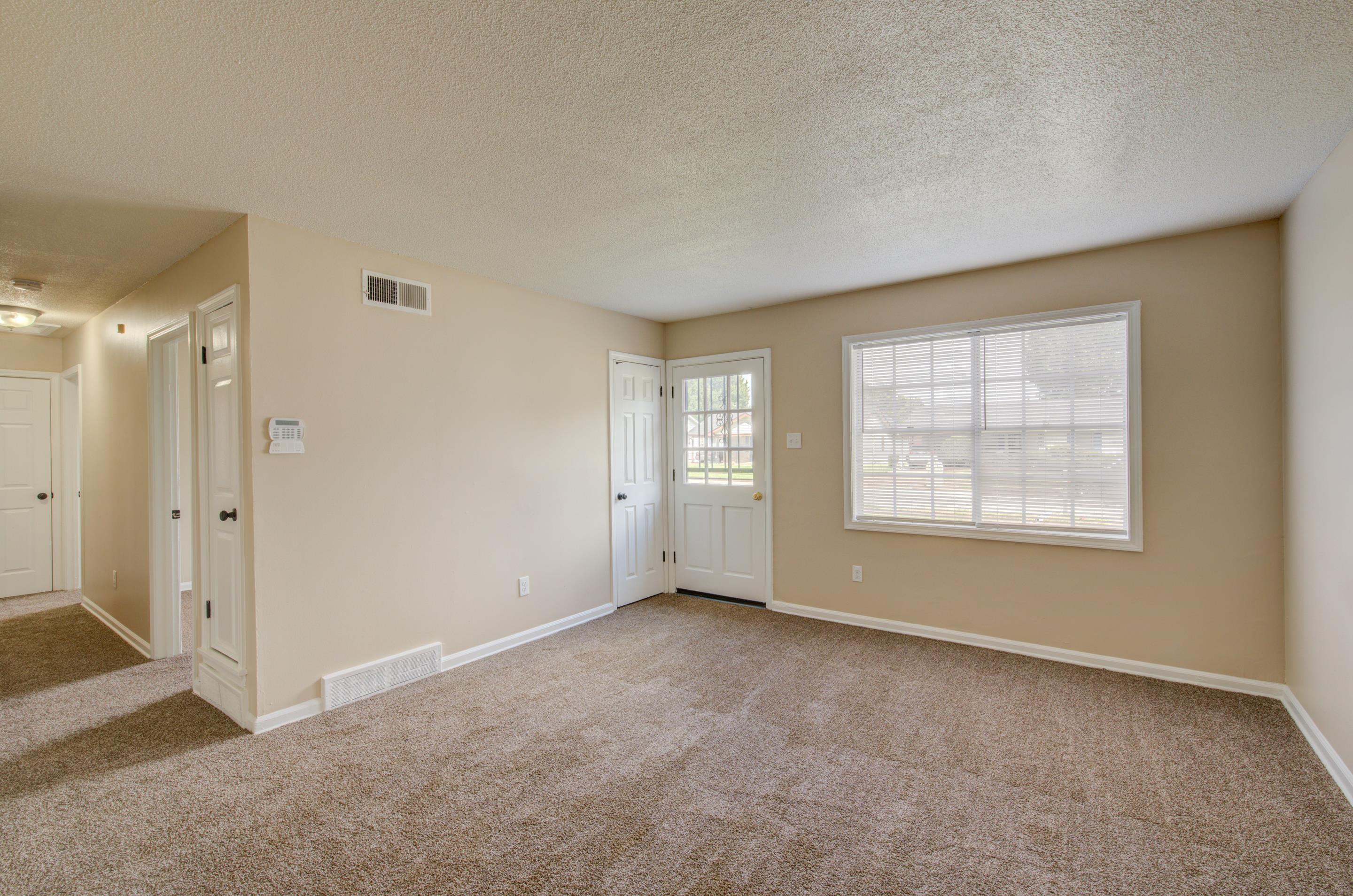 5193 Fairley Road Memphis, TN 38109 - Photo 2 of 17 a view of an empty room with a window