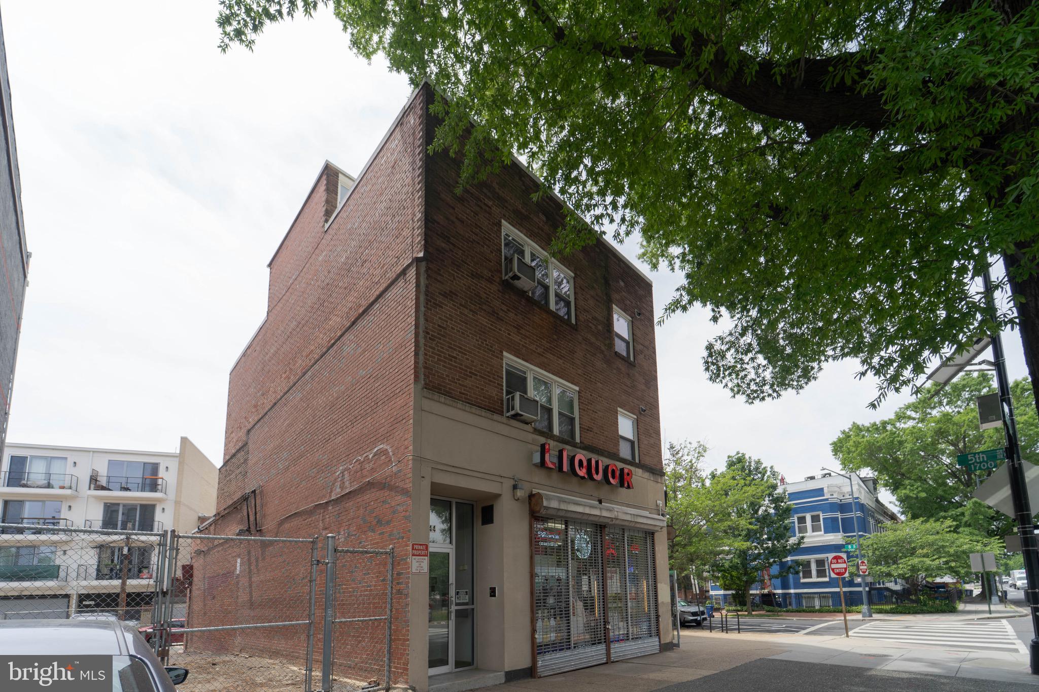 444 Rhode Island Avenue Northwest, Unit 302 Washington, DC 20001 - Photo 1 of 13 a view of a tall building next to a road