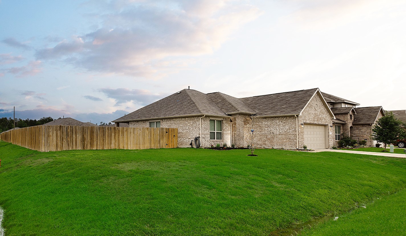 26324 Cooperstown Way Splendora, TX 77372 - Photo 23 of 23 a view of a yard in front of a house