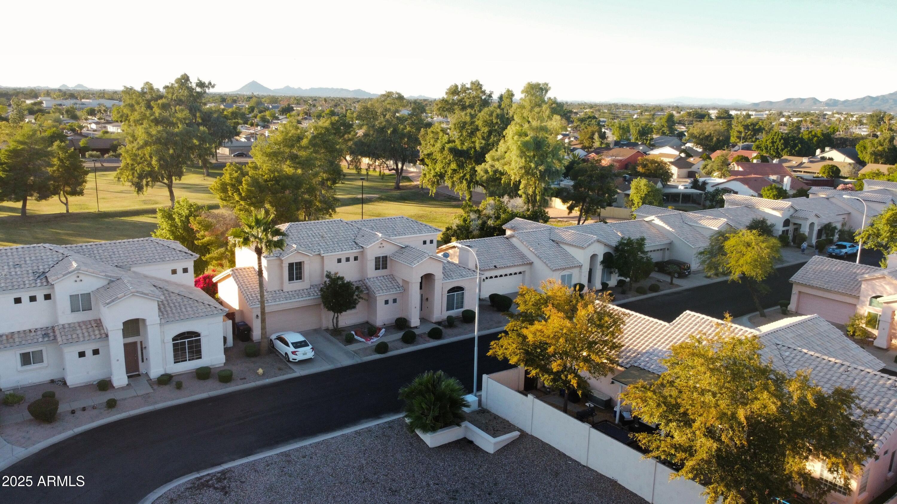 4906 East Brown Road, Unit 38 Mesa, AZ 85205 - Photo 13 of 14 an aerial view of multiple house