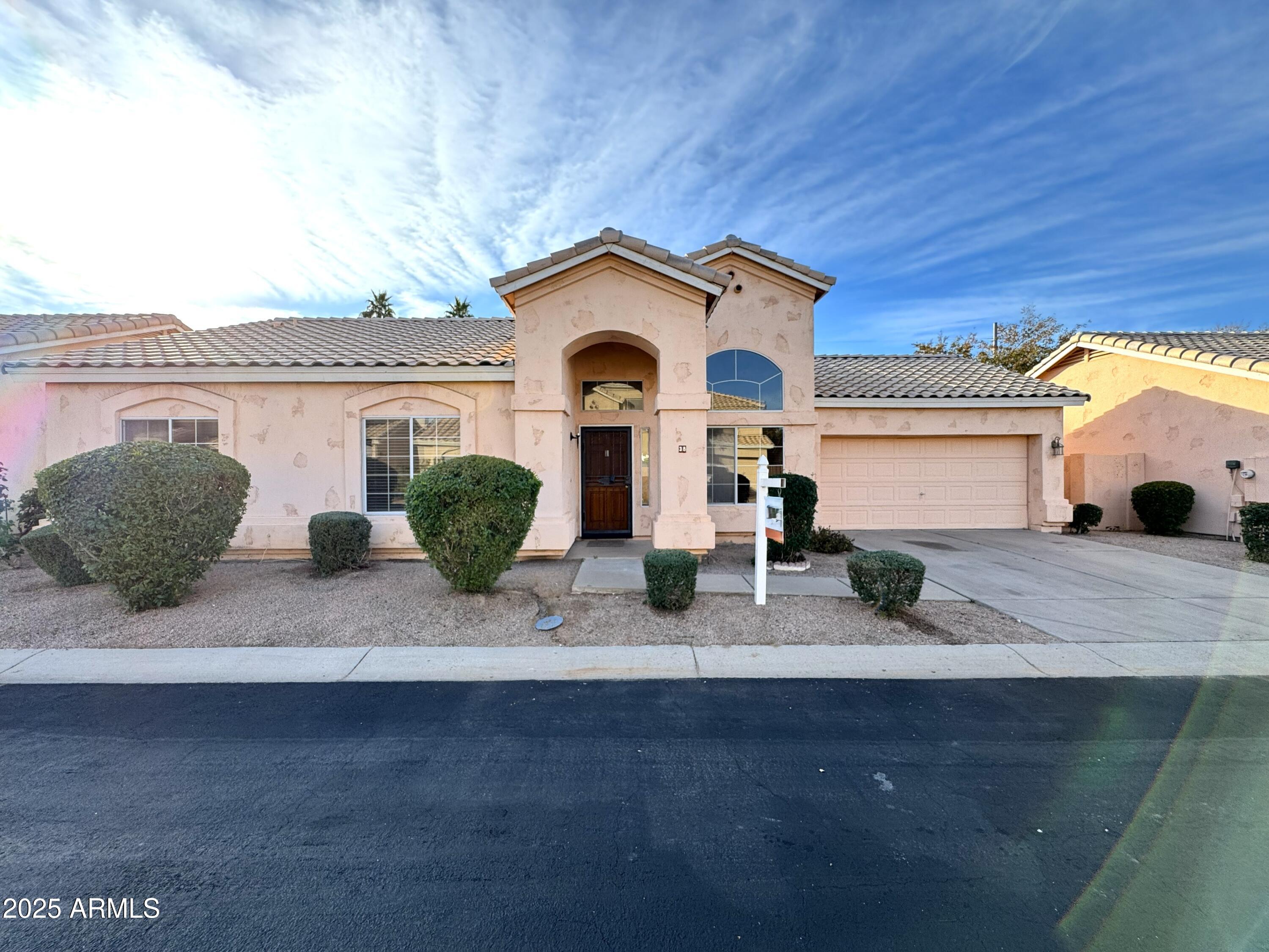 4906 East Brown Road, Unit 38 Mesa, AZ 85205 - Photo 2 of 14 a view of a house with a outdoor space